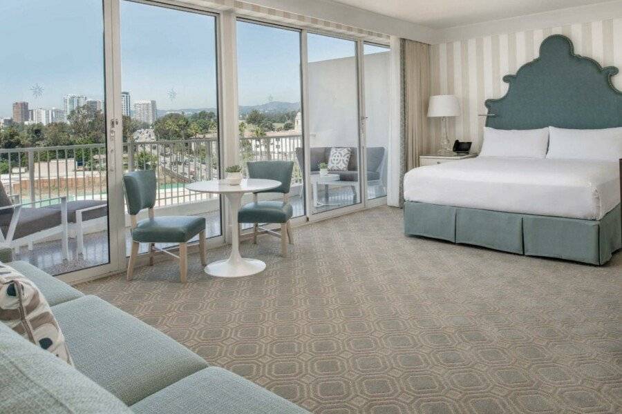 The Beverly Hilton hotel bedroom,balcony