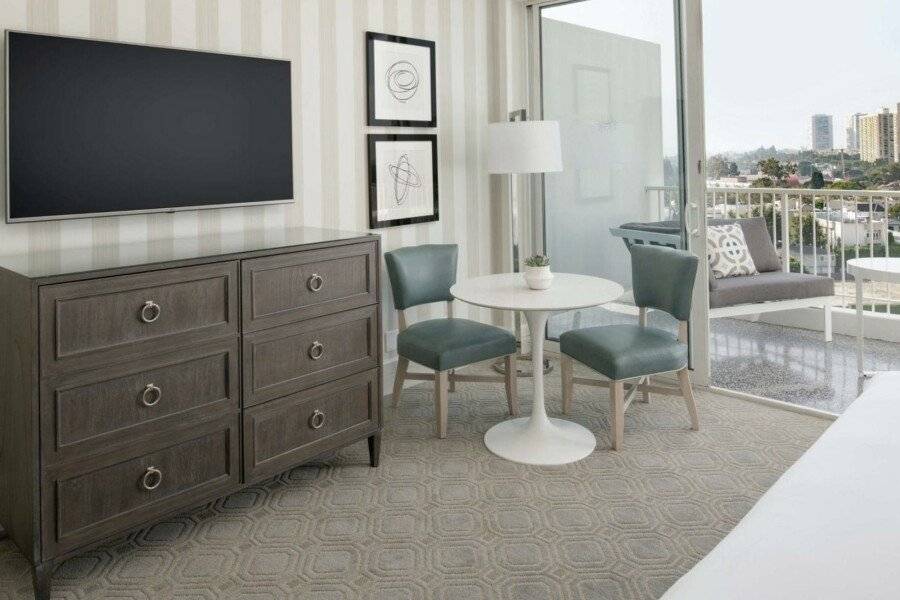 The Beverly Hilton hotel bedroom,balcony,ocean view