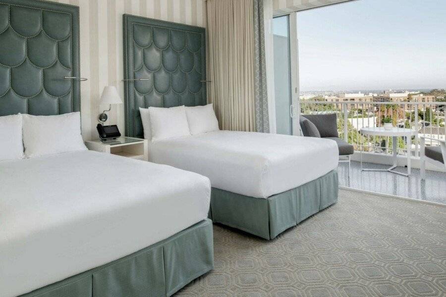 The Beverly Hilton hotel bedroom,balcony,ocean view