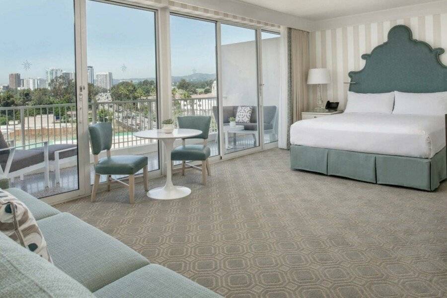 The Beverly Hilton hotel bedroom,balcony,ocean view