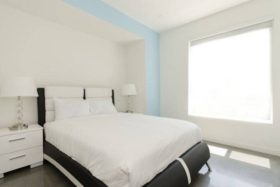 Modern Apartment Rentals hotel bedroom