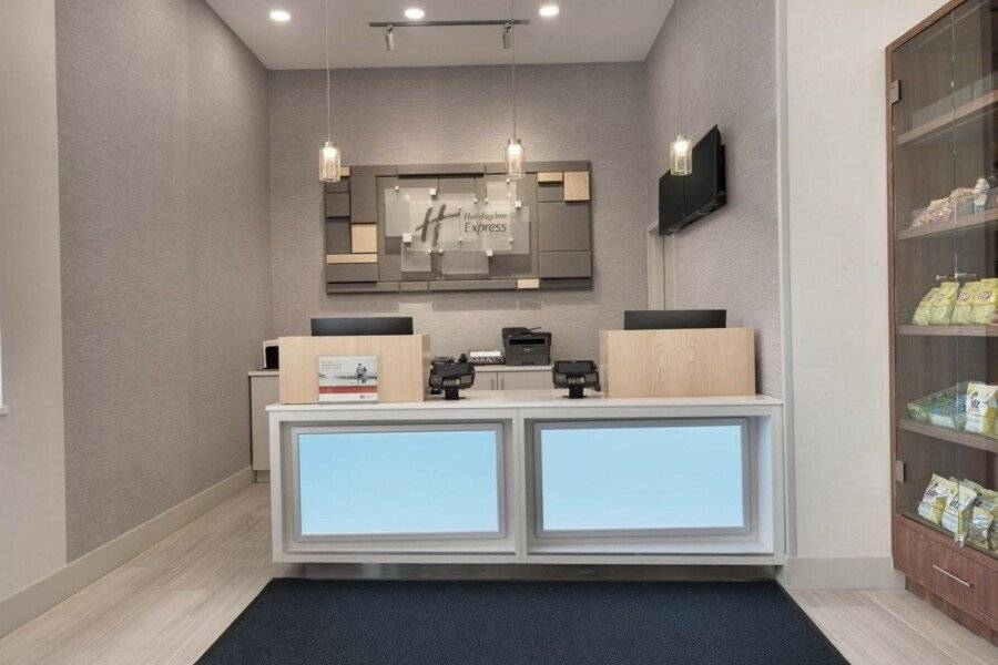 Holiday Inn Express - Jamaica - JFK AirTrain - NYC, an IHG Hotel front desk, lobby, 