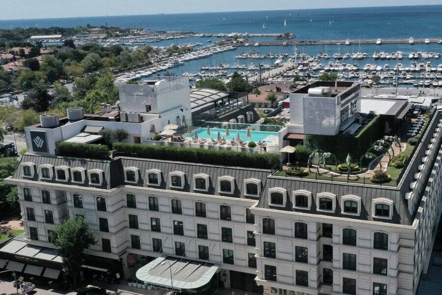 Wyndham Grand Istanbul Kalamış Marina Hotel facade, rooftop pool, ocean view