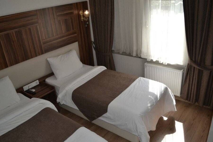 New Fatih Hotel hotel bedroom