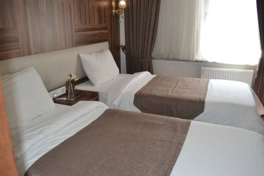 New Fatih Hotel hotel bedroom