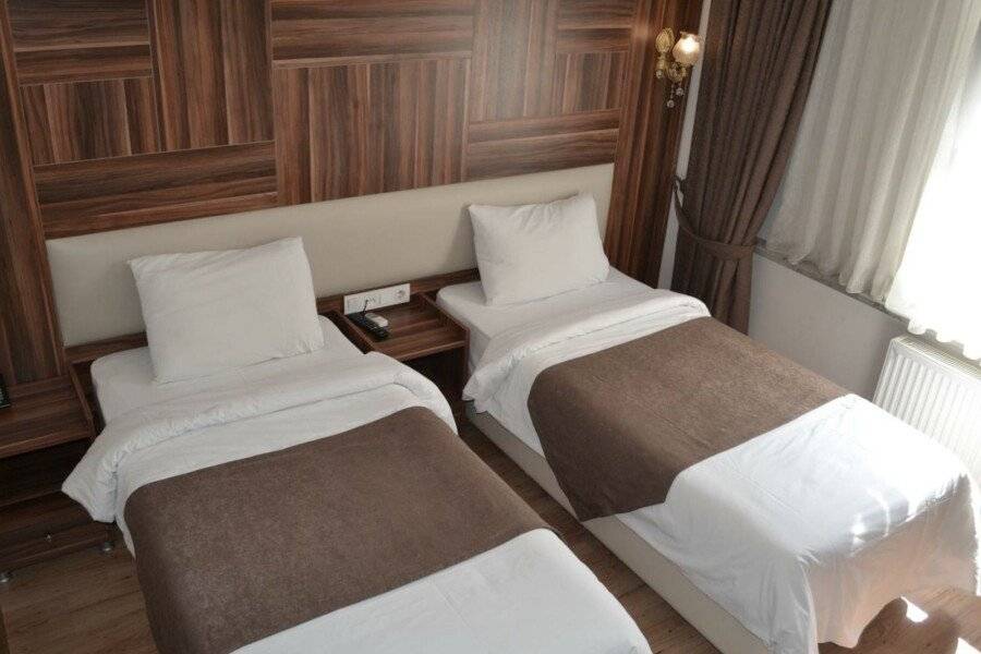 New Fatih Hotel hotel bedroom