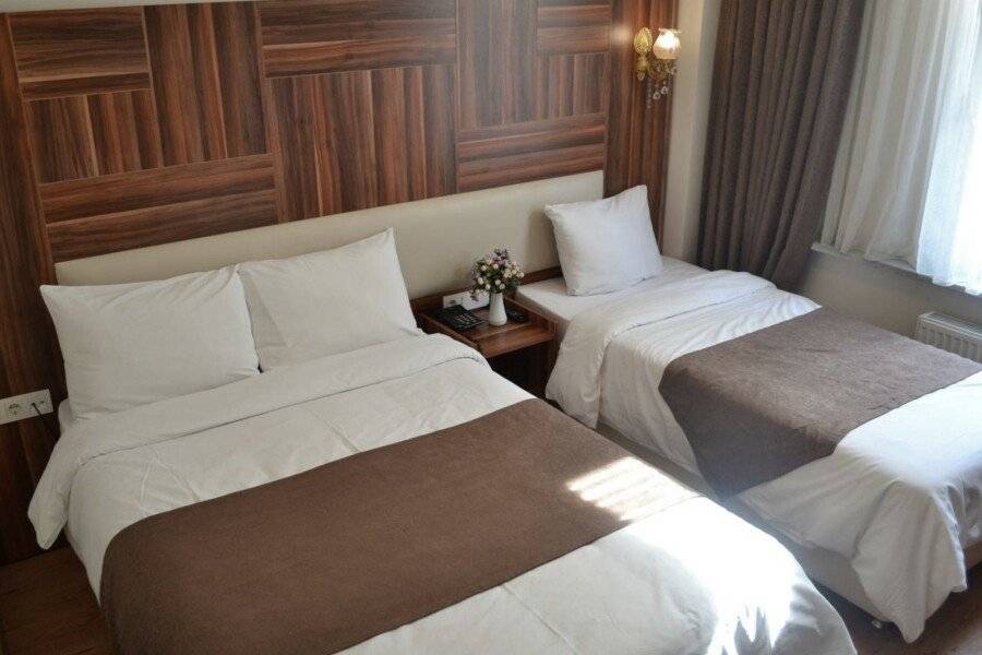 New Fatih Hotel hotel bedroom