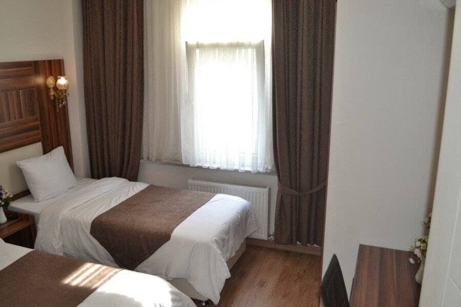 New Fatih Hotel hotel bedroom