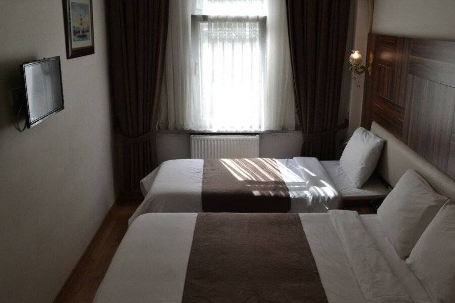 New Fatih Hotel hotel bedroom