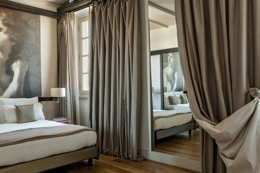 Villa Agrippina Gran Meliá – The Leading Hotels of the World hotel bedroom