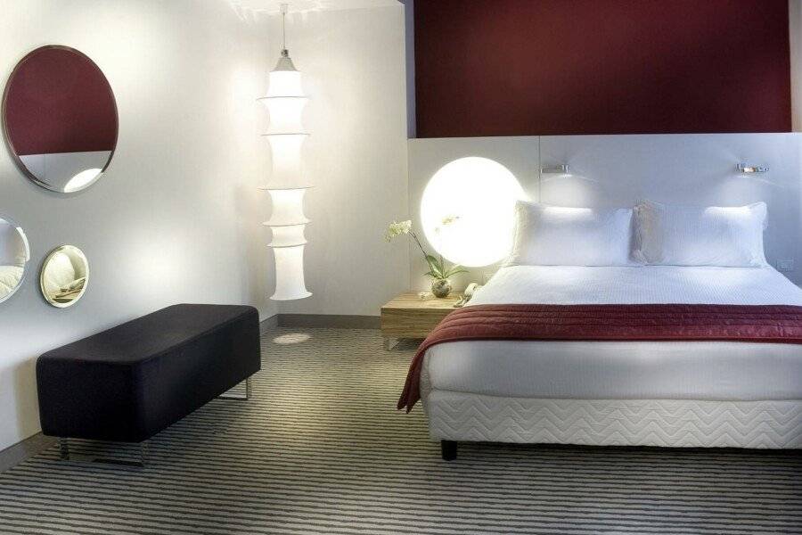 The Caesar Roma hotel bedroom