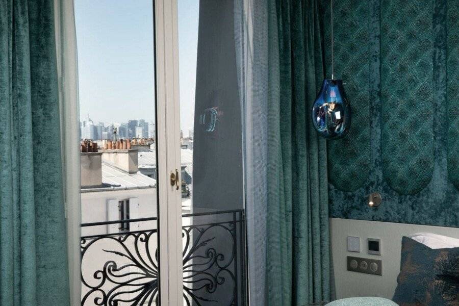 Paris j'Adore Hotel & Spa hotel bedroom,balcony,ocean view