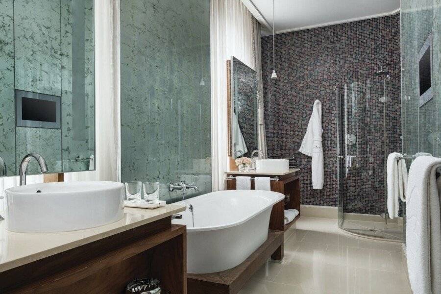 The Langham bathtub,spa,hotel bedroom