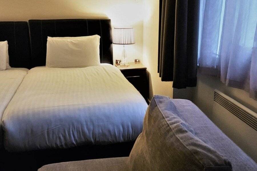 Grand Plaza Serviced Apartments hotel bedroom