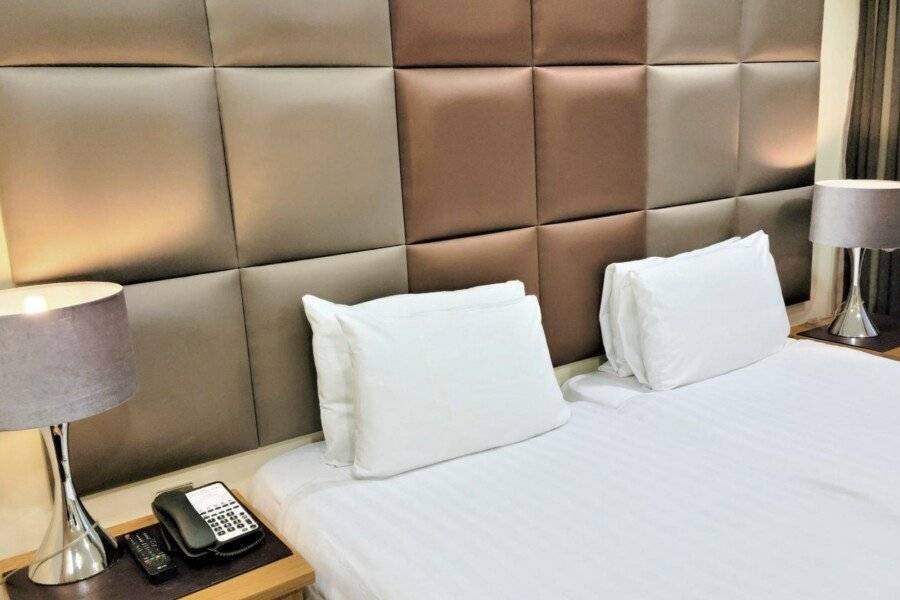 Grand Plaza Serviced Apartments hotel bedroom