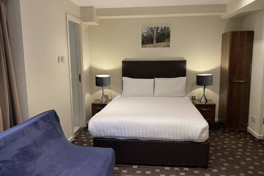 Grand Plaza Serviced Apartments hotel bedroom