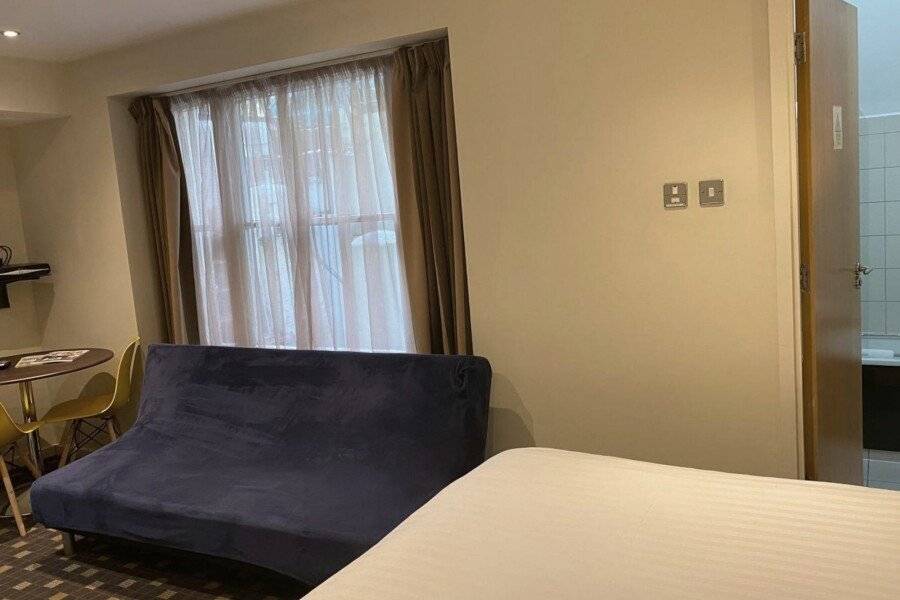 Grand Plaza Serviced Apartments hotel bedroom