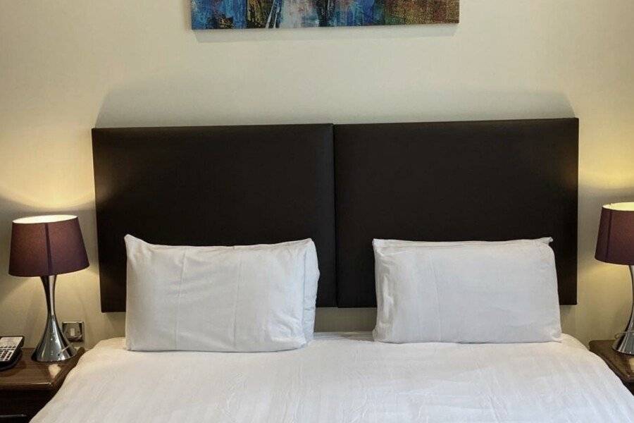 Grand Plaza Serviced Apartments hotel bedroom