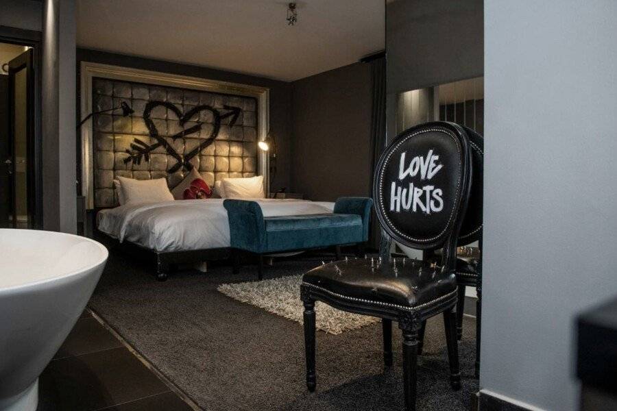 The Exhibitionist Hotel hotel bedroom