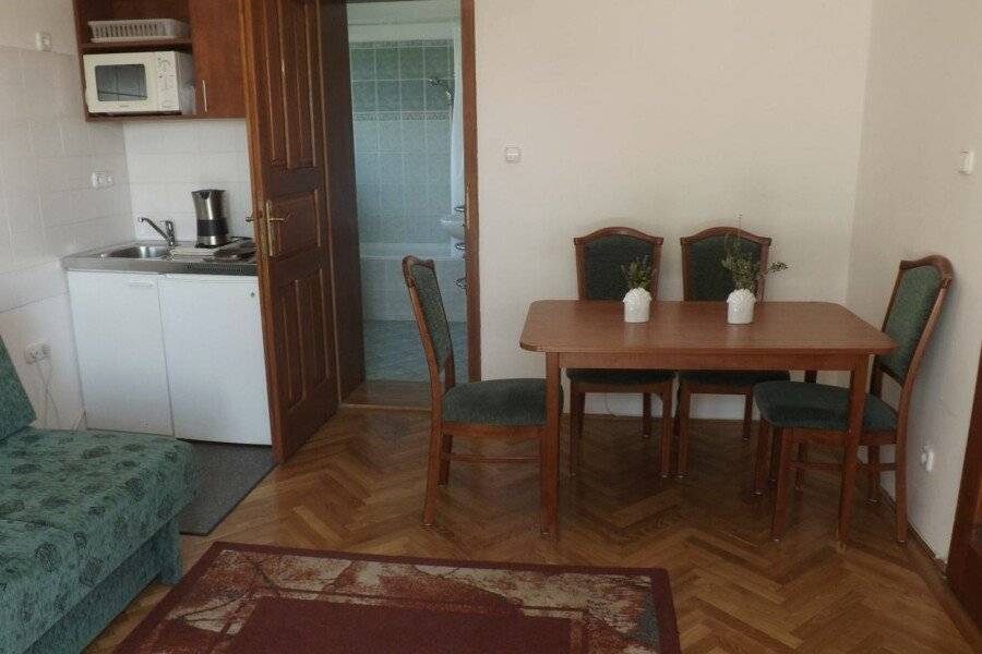 HELIOS Hotel Apartments kitchen,hotel bedroom