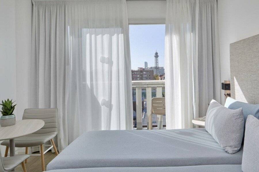 INNSiDE by Meliá Barcelona Apolo hotel bedroom,balcony,ocean view