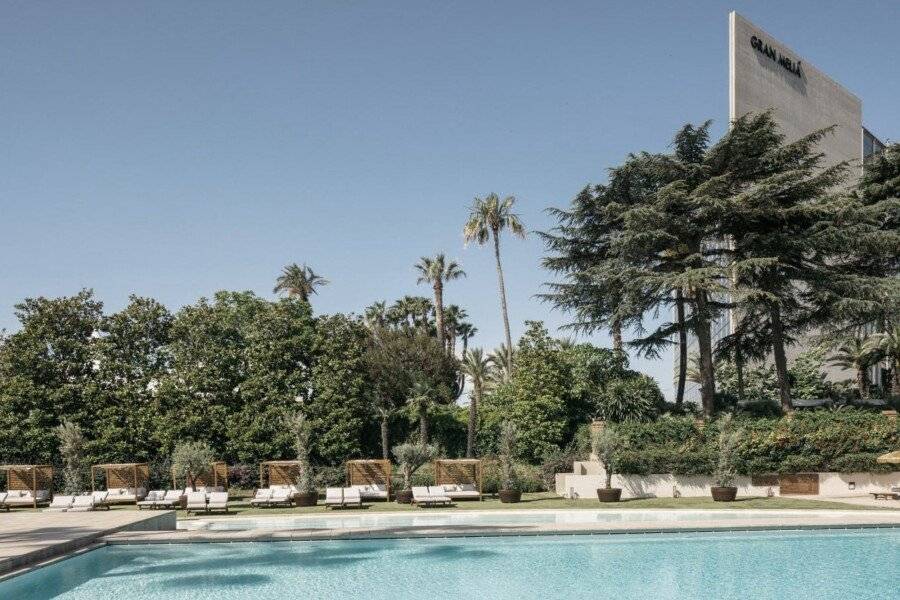 Torre Melina, a Gran Meliá Hotel outdoor pool,hotel facade,garden