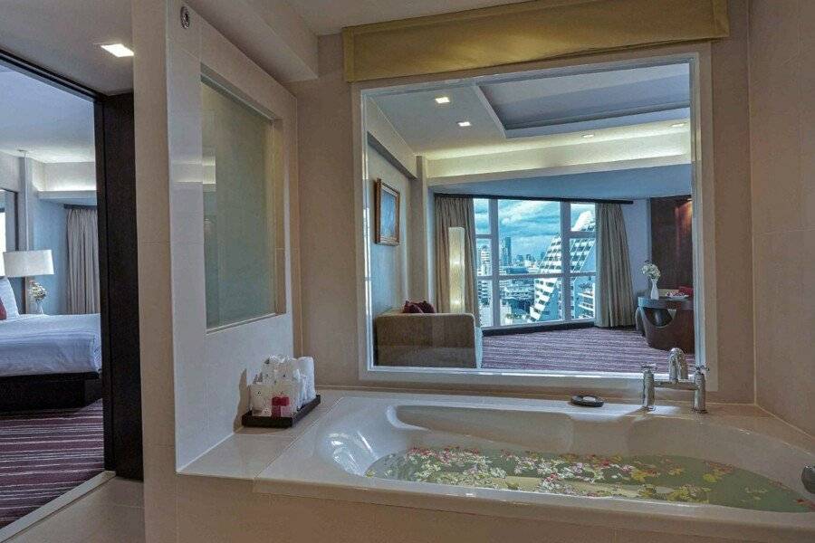 Ambassador Hotel Bangkok - SHA Extra Plus bathtub,hotel bedroom,ocean view