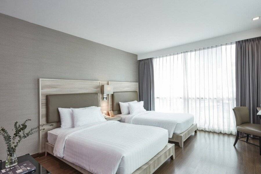 Adelphi Suites Bangkok - SHA Extra Plus hotel bedroom