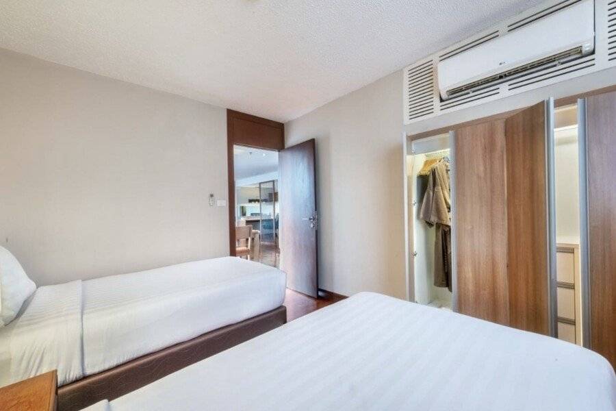 Bandara Suites Silom hotel bedroom