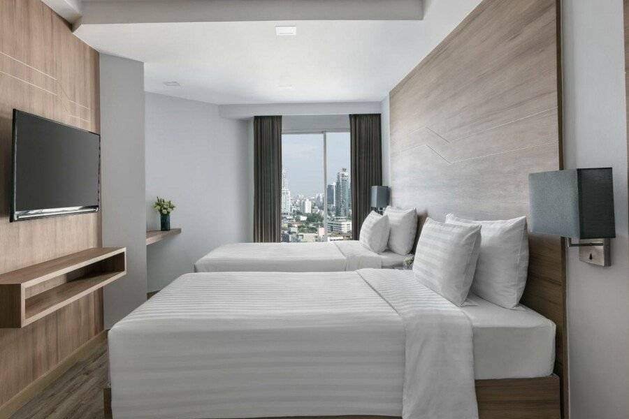 Adelphi Grande Sukhumvit hotel bedroom,ocean view