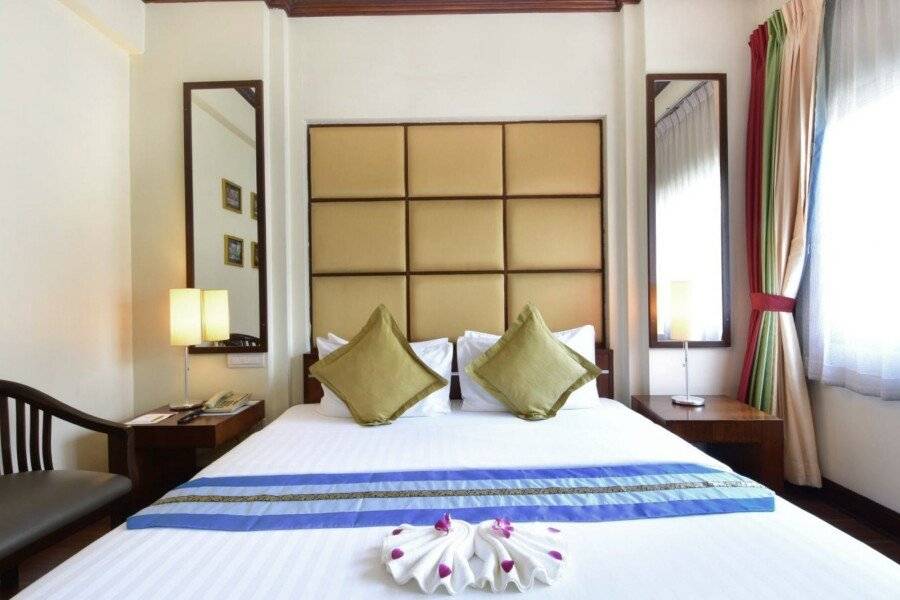 Grand Business Inn hotel bedroom