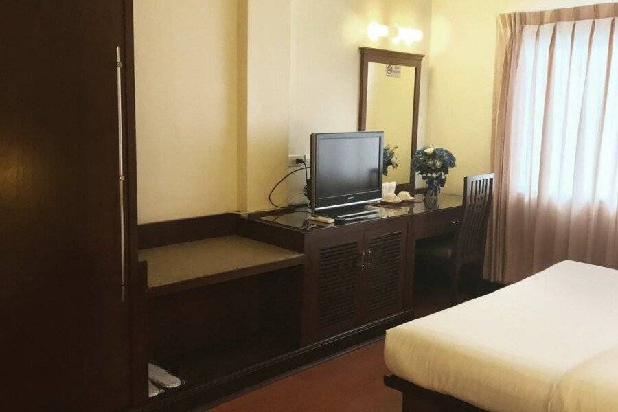 Grand Business Inn hotel bedroom