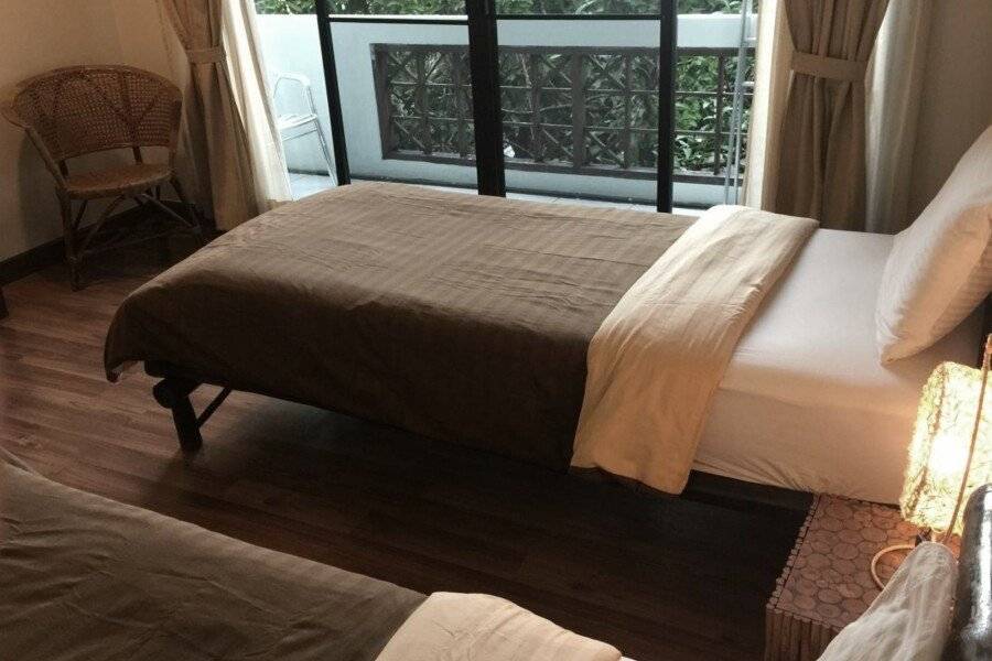 Lamphuhouse Bangkok - SHA Extra Plus Certified hotel bedroom