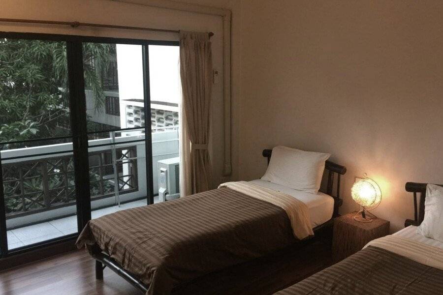 Lamphuhouse Bangkok - SHA Extra Plus Certified hotel bedroom,balcony