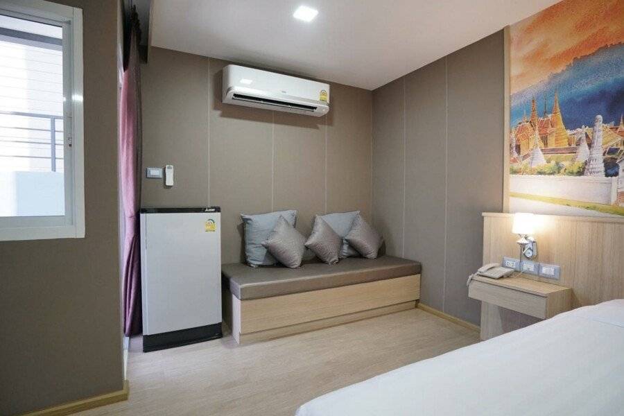 The Qube fifty Hotel hotel bedroom