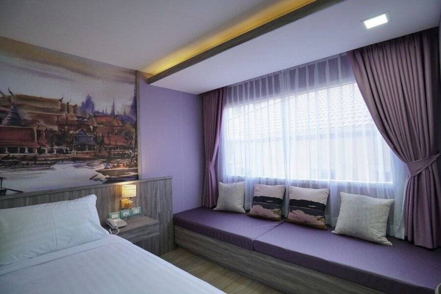 The Qube fifty Hotel hotel bedroom