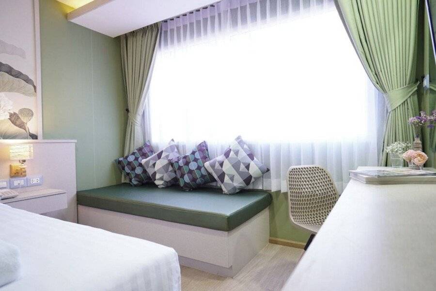 The Qube fifty Hotel hotel bedroom