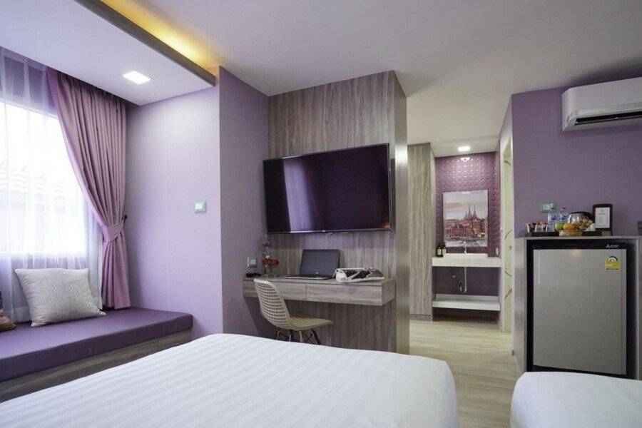 The Qube fifty Hotel hotel bedroom