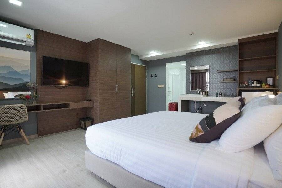 The Qube fifty Hotel hotel bedroom