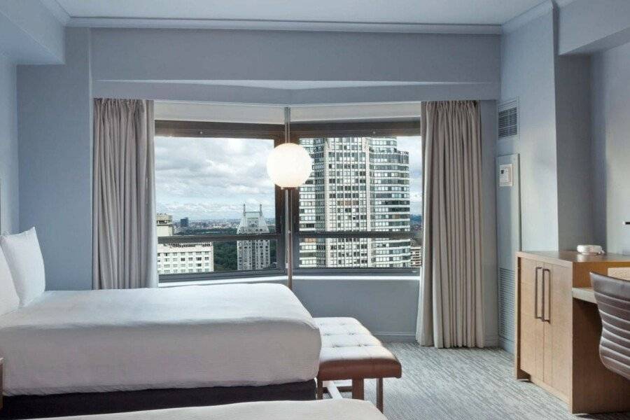 New York Hilton Midtown hotel bedroom