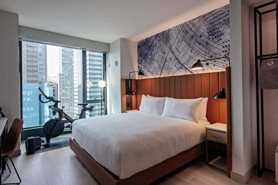 Tempo By Hilton Times Square hotel bedroom,fitness centre,ocean view