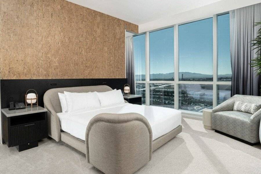 Virgin Hotels, Curio Collection by Hilton hotel bedroom,ocean view