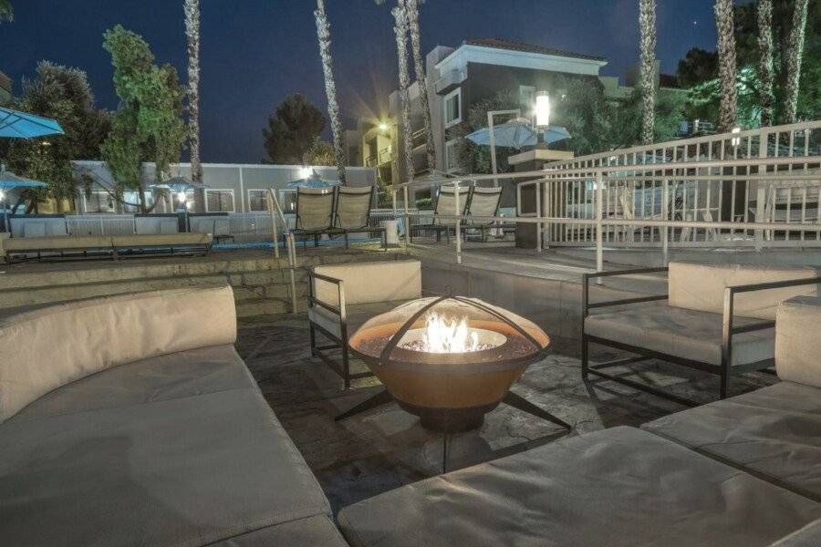 Desert Rose Resort outdoor pool,fire pit