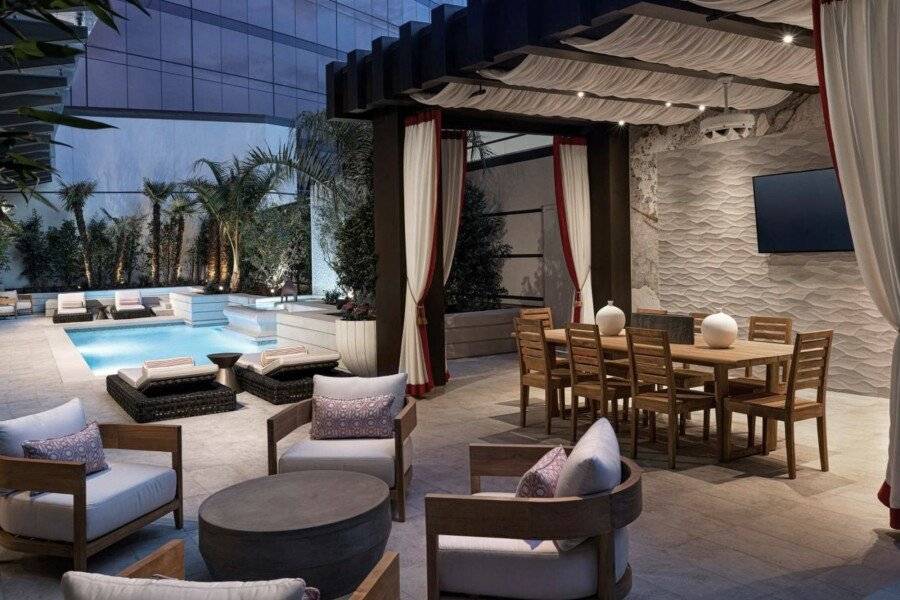 Crockfords Las Vegas, LXR Hotels & Resorts at Resorts World outdoor pool, lounge