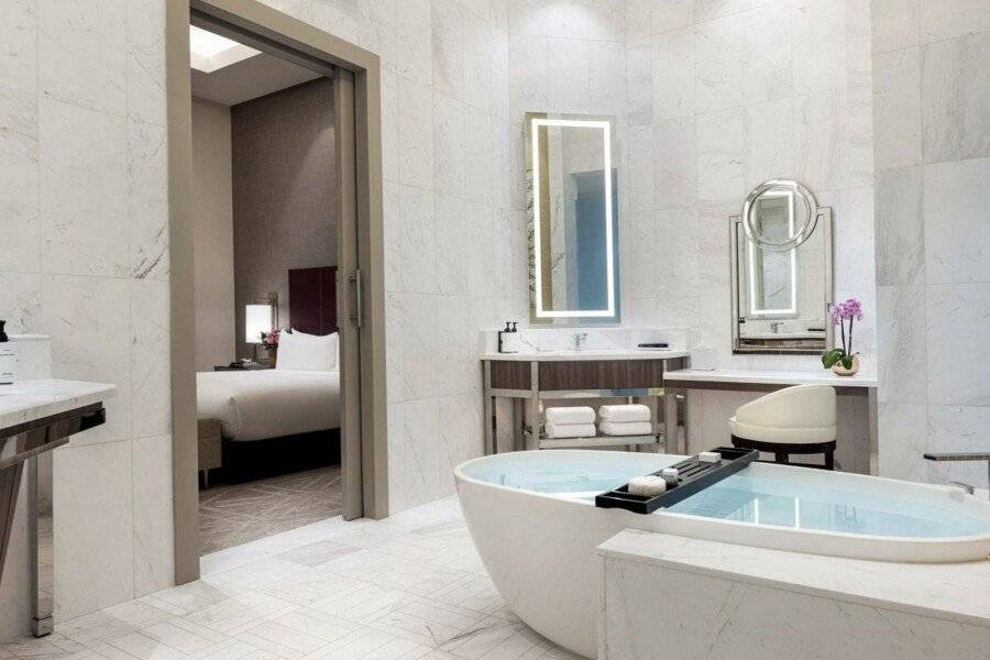 Crockfords Las Vegas, LXR Hotels & Resorts at Resorts World bathtub,hotel bedroom