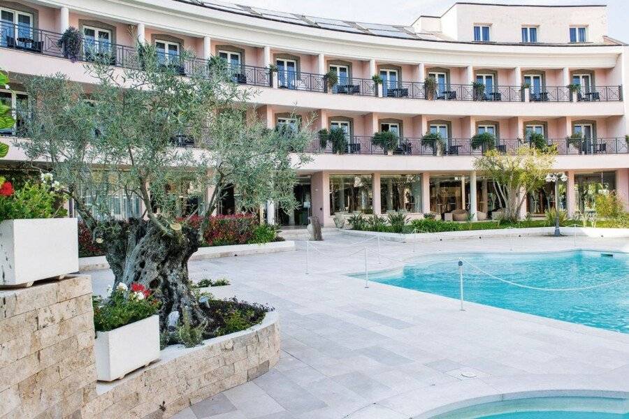 Hotel Isola Sacra Rome Airport facade, outdoor pool, garden