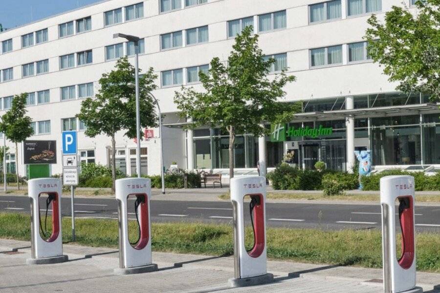 Holiday Inn Berlin Airport facade,parking,electrical vehicle charging station