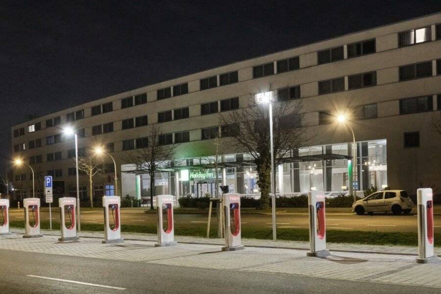 Holiday Inn Berlin Airport facade, electrical vehicle charging station