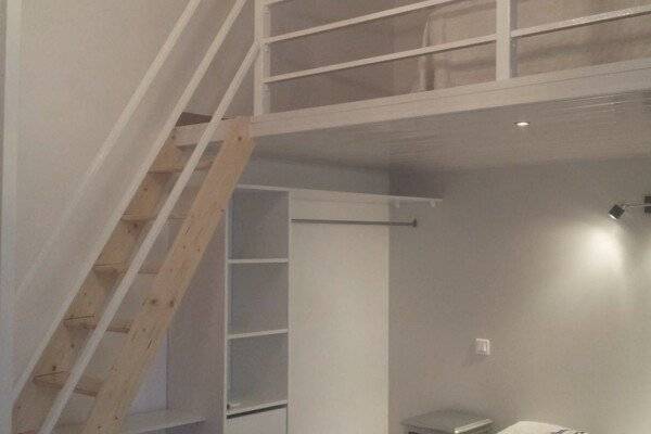 Triple Room Mezzanine with Balcony and Courtyard View